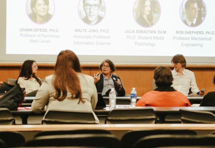 Graduate student Julia Sebastien (left) is pictured with Cornell Professor JoAnn Difede and Cornell Associate Professor Malte Jung at the “Human Psychology, Purpose and Social Life in the Age of AI and Ubiquitous Computing.”