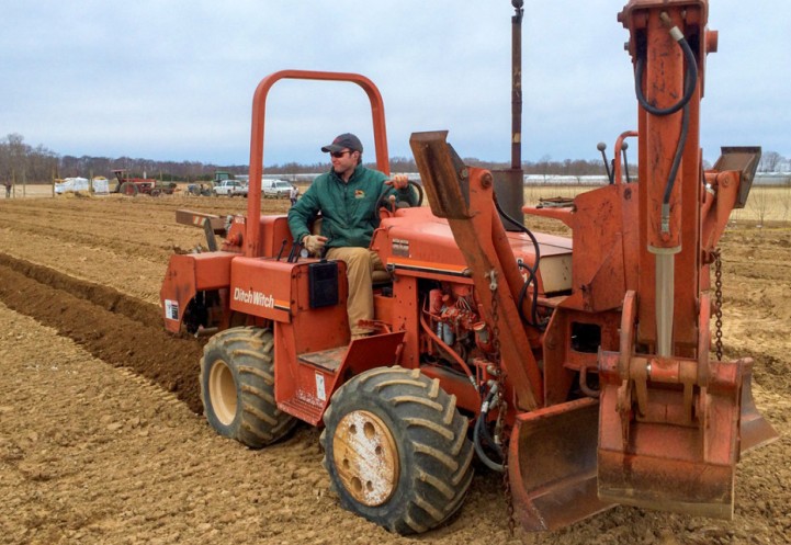 Edward Harbes IV planting a new apple orchard in 2014.
