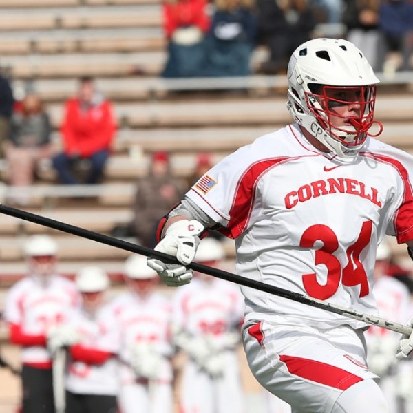 jack pulver running in his lacrosse uniform