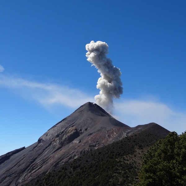 Guatemala’s  Fuego volcano spews an ash column