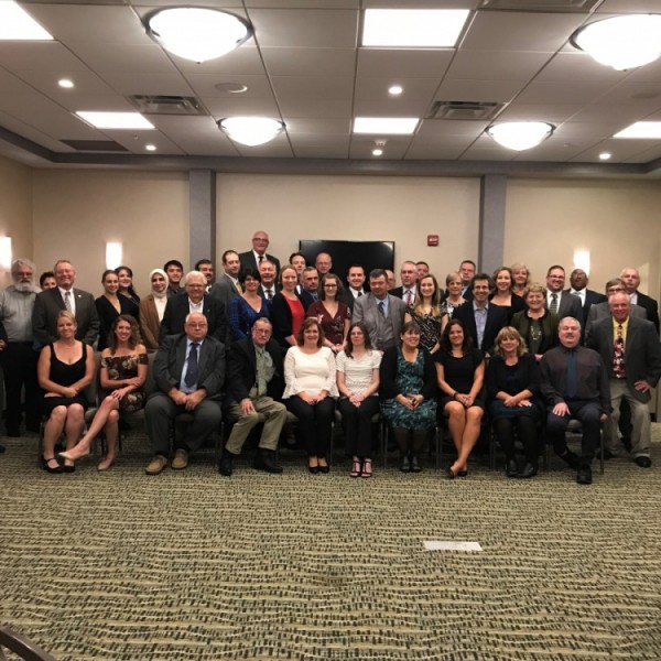 Program goers take a group photo