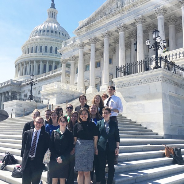 students standing on steps