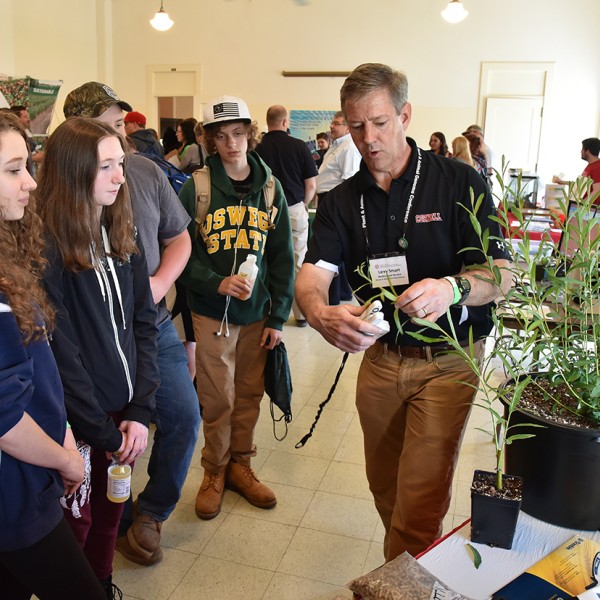 Larry Smart speaking with high school students
