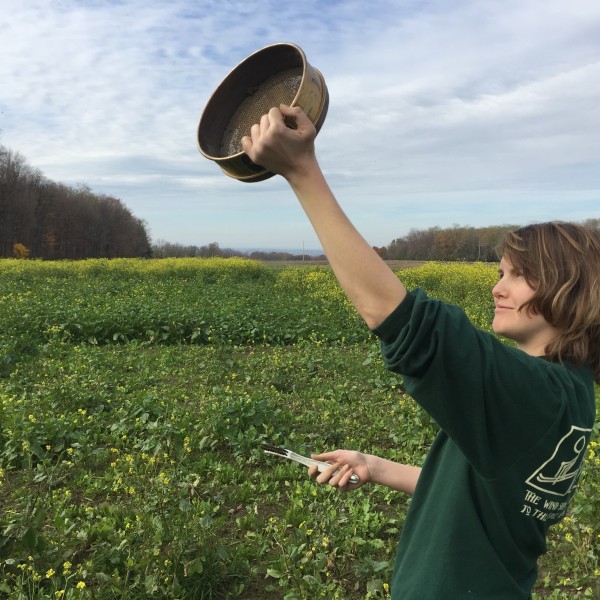 Ann Bybee-Finley standing in crop field