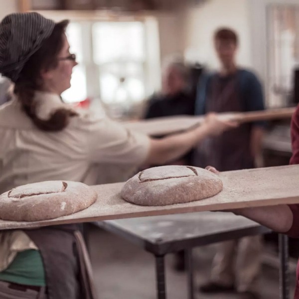 bakers with bread