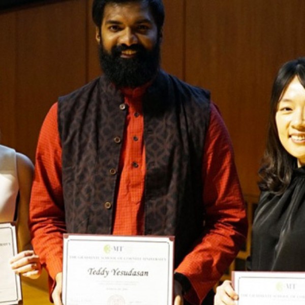 Pamela Meyerhofer, Teddy Yesudasan, and Shao-Pei Chou pose with awards