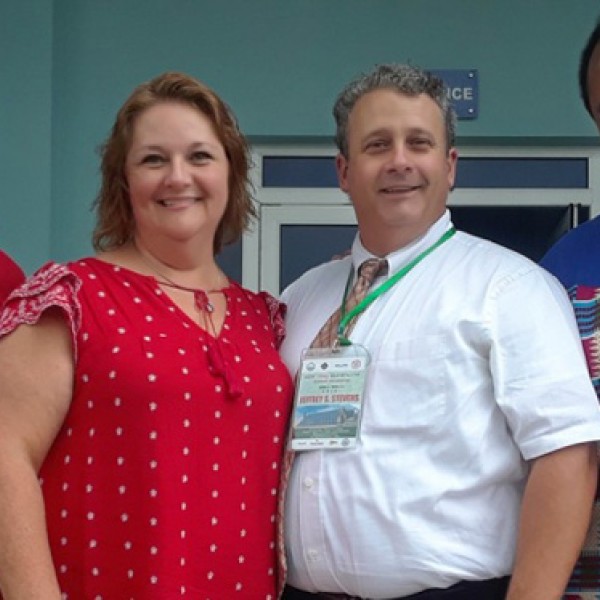 Emmanuel Ajani, and Tarig Ahmed are pictured with Jeffrey and Linda Stevens