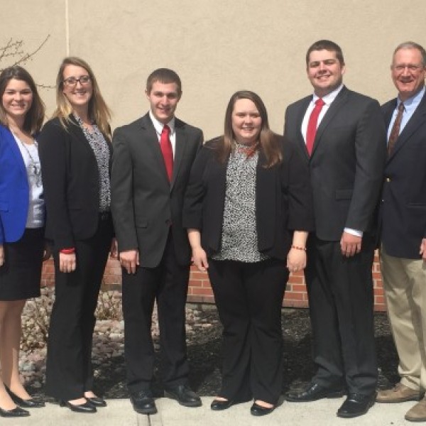 A group of people in professional clothing