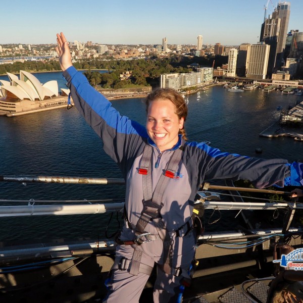 A student standing on a bridge in Australia 