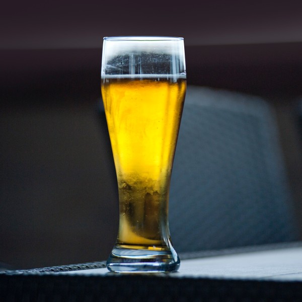 A glass of beer on a table