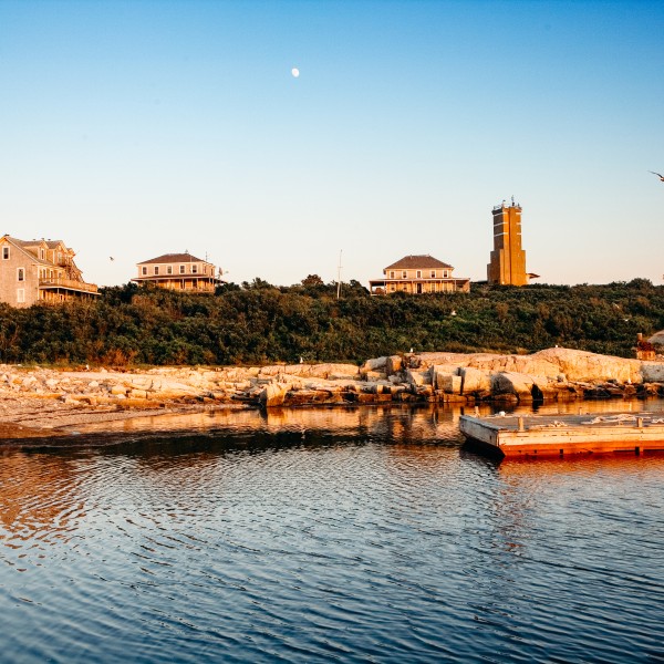 View of Shoals Marine Laboratory from the water at dusk.