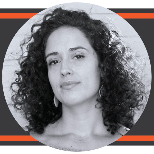 Dark charcoal with a box of orange with a circular portrait photograph of a woman with curly hair over top the graphic.