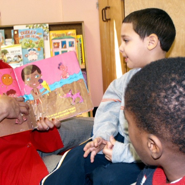 Older volunteers help NYC children grow, learn through play