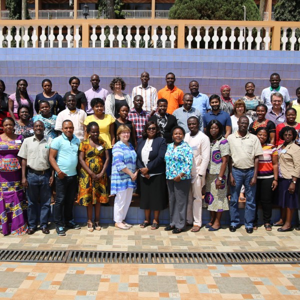 Group of workshop participants pose for photo in Uganda