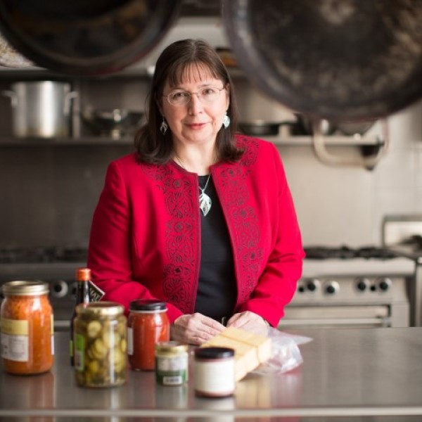 Olga Padilla-Zakour standing in a kitchen