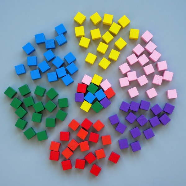 image of 5 groups of blocks with an mixture group in the middle