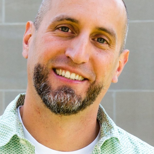 man with green shirt