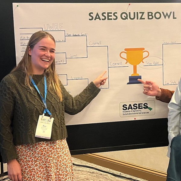 crop judging team with bracket board