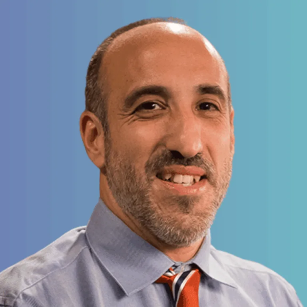 Professional portrait of aerson wearing a collared shirt and tie.