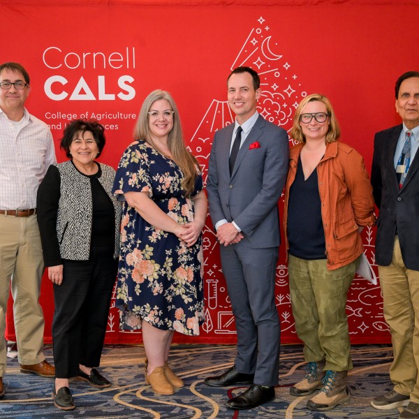 Dean Houlton poses with awardees at the Faculty and Staff Awards ceremony