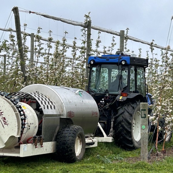 A tractor outfitted with precision cropload management gear. 