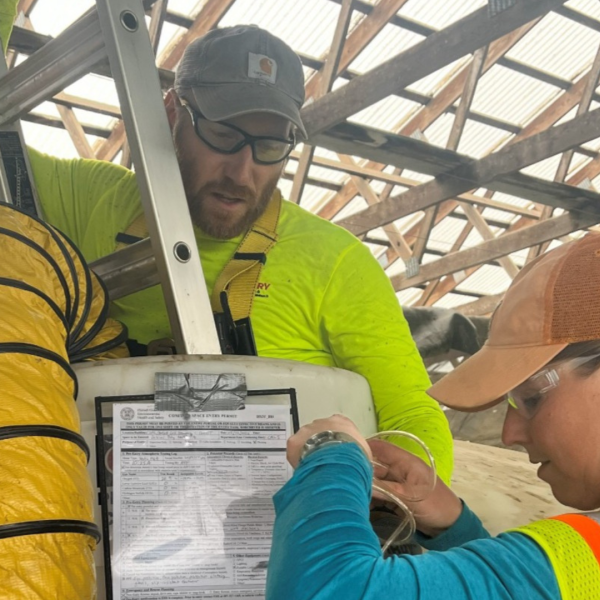 two people perform a manure safety test