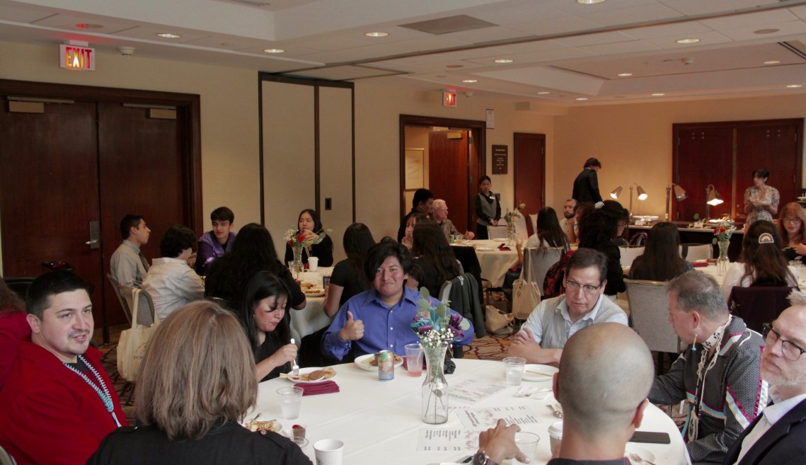 People sit around tables.