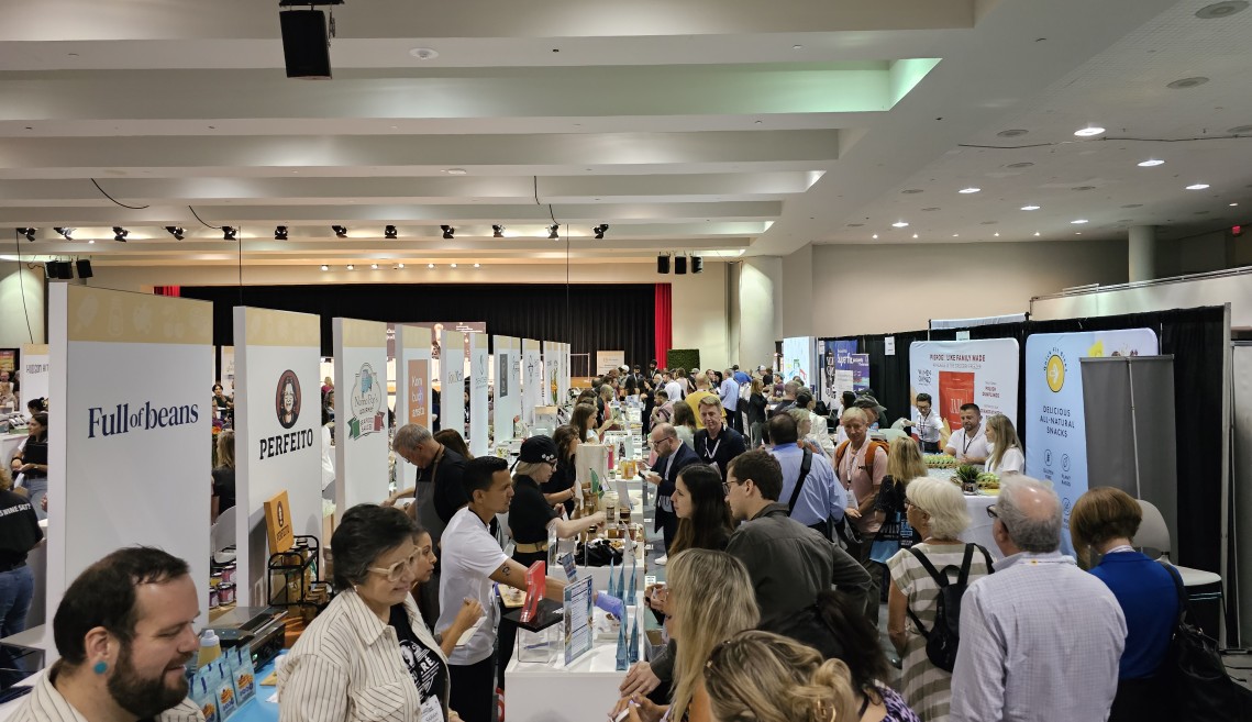 A group of people in an exhibition hall. 