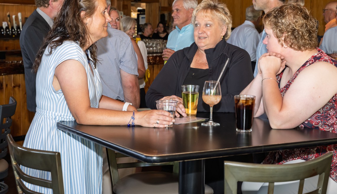 People talking at a table