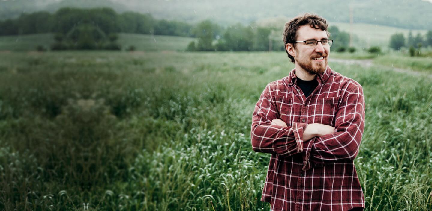 Guy standing in a field