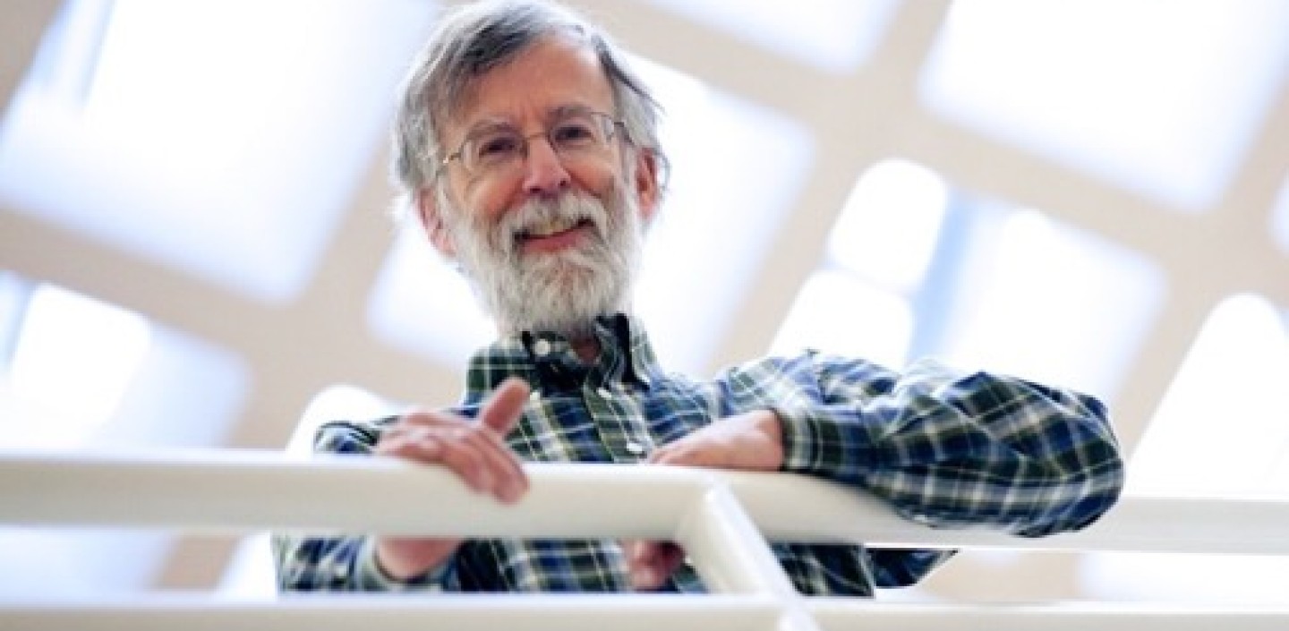 Andy Clark leaning on a white railing
