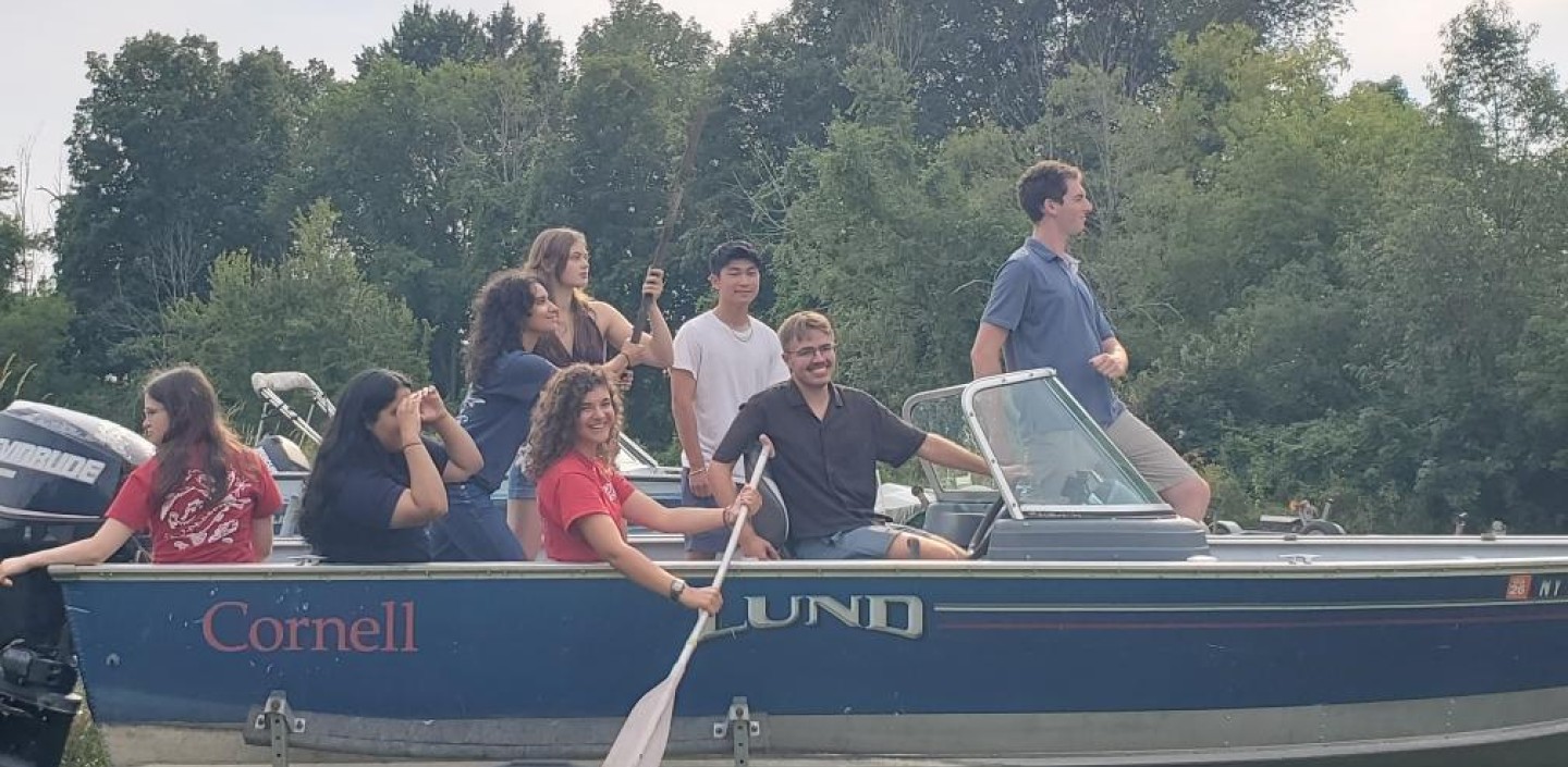 group of students in a boat 