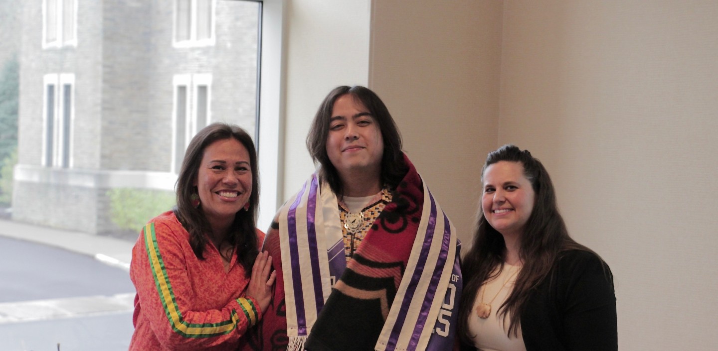 Peter is blanketed at the Awards & Recognition Ceremony.