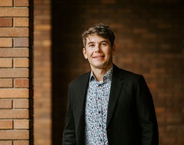 headshot of Louis Longchamps