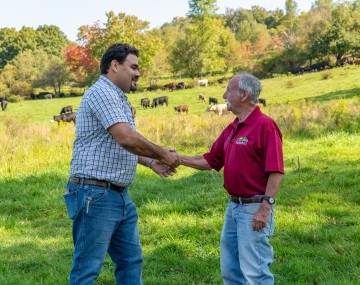 Two people shaking hands. 