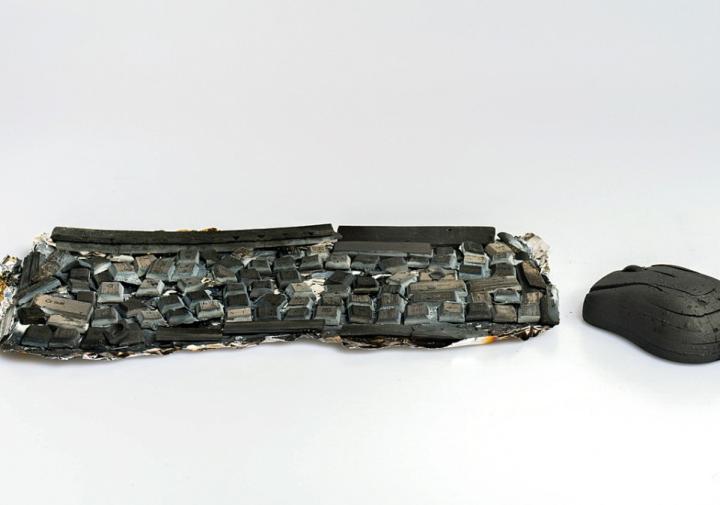 A black, melted keyboard