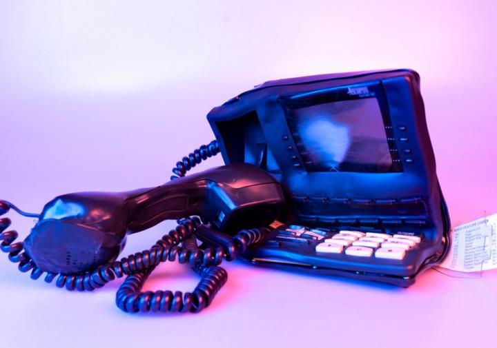 A black, melted phone