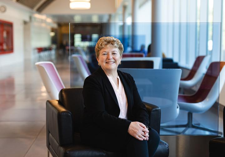 Dean Kathryn J. Boor, Ronald P. Lynch Dean, sits in Stocking Hall's main corridor. 