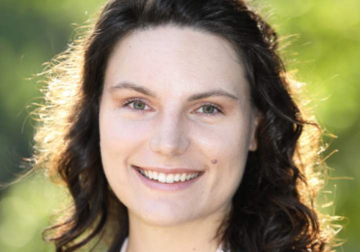 Jacquelyn M. Evans smiling outdoors