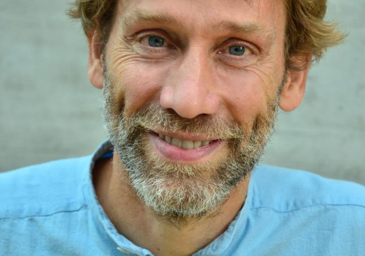 Person in a blue shirt