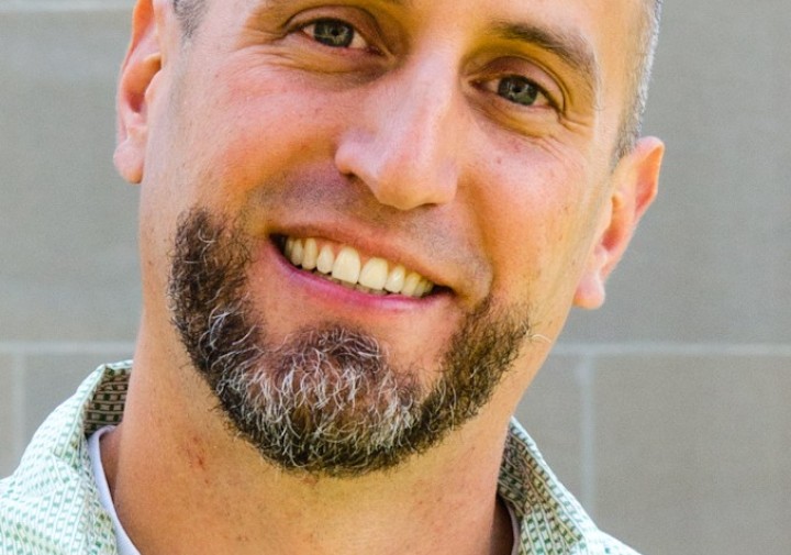 man with green shirt