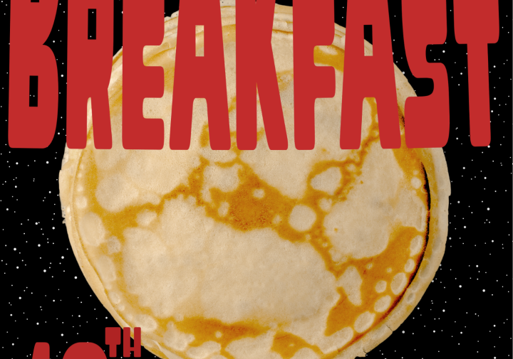 A poster with red lettering and a pancake moon.
