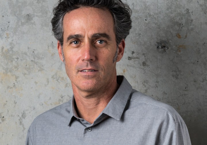 Craig standing in front of concrete wall