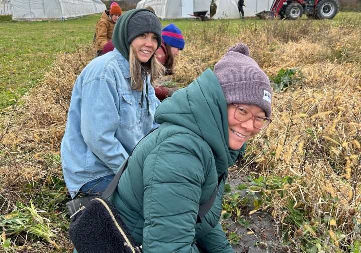 Mallory in a strawberry patch.