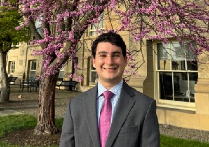 Man in suit with pink tie