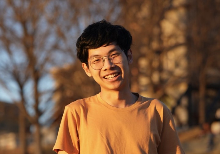 Man in yellow shirt