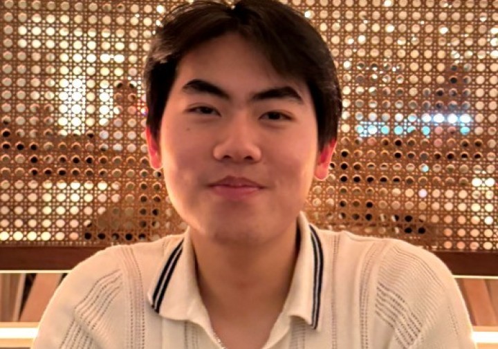 Man in white polo