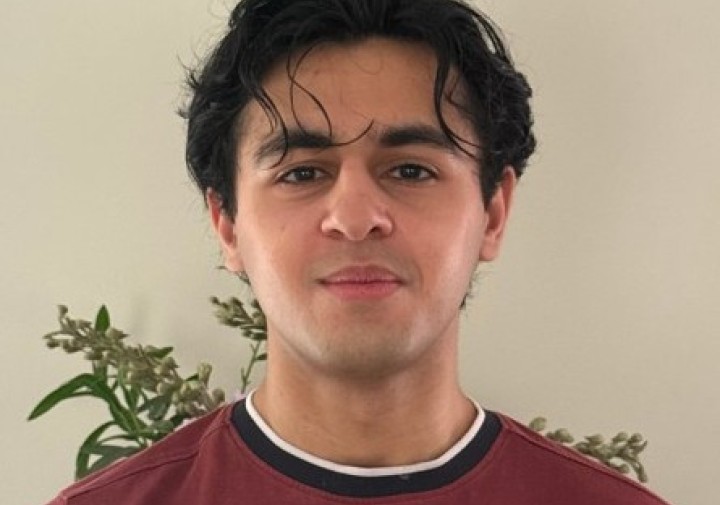 Smiling man with red shirt