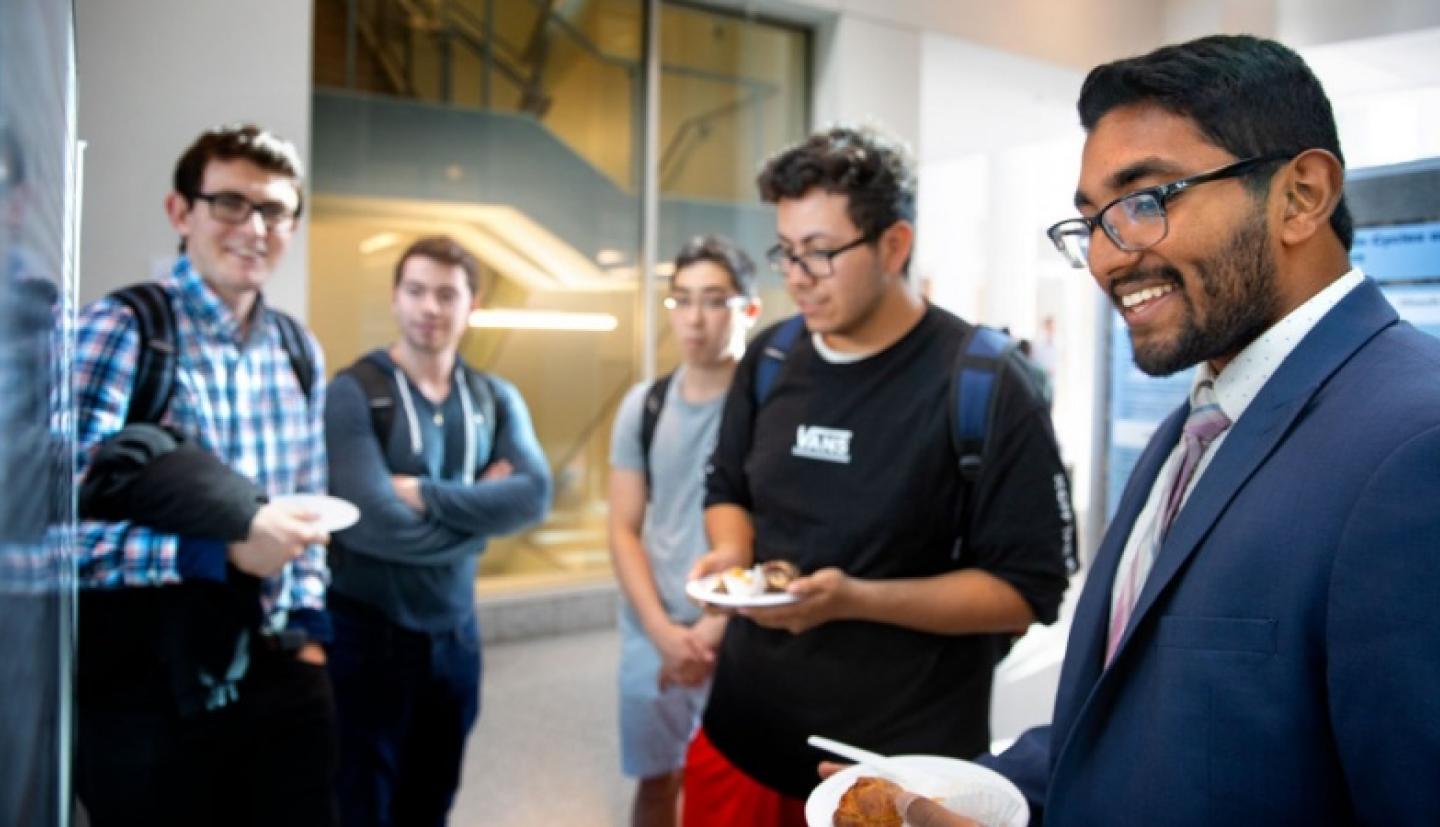 Jacob Mathai describes his research at the Rawlings Research Scholars Senior Expo