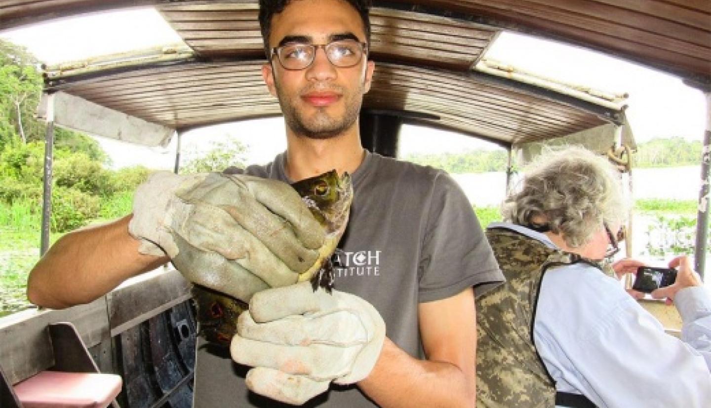 Sinan Kassam holding an Oscar Piranha